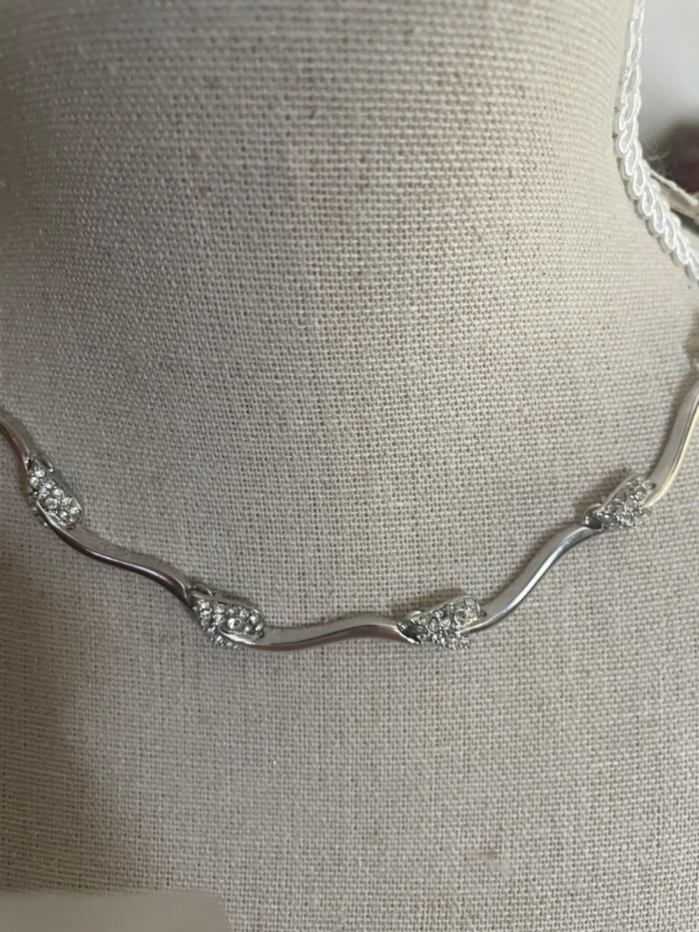 Elegant Silver Wave Necklace with Crystal Accents